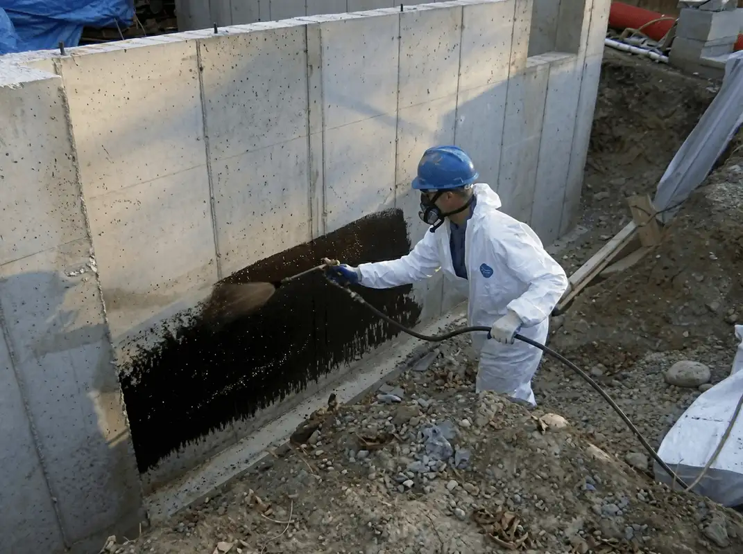 Professional waterproofing the exterior walls of the basement in Shreveport, LA