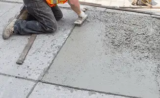 Professional repairing a concrete floor in Shreveport, LA
