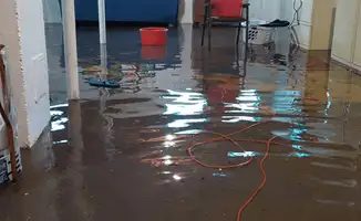 Basement with boiler, cabinets and washing machine completely flooded in Shreveport, LA