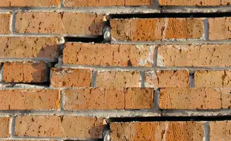 Brick wall with serious structural damage in Shreveport, LA